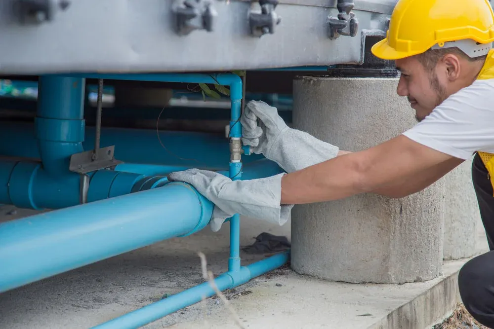 Person checking water pipe
